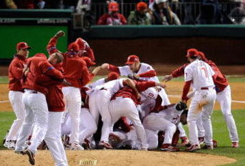 PHILADELPHIA - OCTOBER 29:  The Philadelphia Phillies celebrate after they won 4-3 against the Tampa Bay Rays during the continuation of game five of the 2008 MLB World Series on October 29, 2008 at Citizens Bank Park in Philadelphia, Pennsylvania.  (Photo by Jeff Zelevansky/Getty Images)