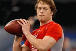 INDIANAPOLIS, IN - FEBRUARY 22:  Quarterback Matthew Stafford of USC passes the football during the NFL Scouting Combine presented by Under Armour at Lucas Oil Stadium on February 22, 2009 in Indianapolis, Indiana. (Photo by Scott Boehm/Getty Images)