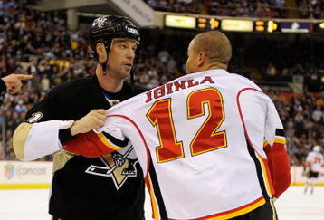 PITTSBURGH - MARCH 25: Forwards Bill Guerin #13 of the Pittsburgh Penguins and Jarome Iginla #12 of the Calgary Flames wrestle with each other on March 25, 2009 at Mellon Arena in Pittsburgh, Pennsylvania.  (Photo by Jamie Sabau/Getty Images)