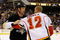 PITTSBURGH - MARCH 25: Forwards Bill Guerin #13 of the Pittsburgh Penguins and Jarome Iginla #12 of the Calgary Flames wrestle with each other on March 25, 2009 at Mellon Arena in Pittsburgh, Pennsylvania.  (Photo by Jamie Sabau/Getty Images)