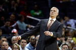 CHARLOTTE, NC - MARCH 16:  Head coach Jay Triano of the Toronto Raptors watches his team in action against the Charlotte Bobcats during their game at Time Warner Cable Arena on March 16, 2009 in Charlotte, North Carolina.  NOTE TO USER: User expressly acknowledges and agrees that, by downloading and/or using this Photograph, user is consenting to the terms and conditions of the Getty Images License Agreement.  (Photo by Streeter Lecka/Getty Images)