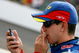 INDIANAPOLIS - JULY 28: Kyle Busch, driver of the #5 Kellogg's/CARQUEST Chevrolet, looks at his cellphone on pit road during qualifying for the NASCAR Nextel Cup Series Allstate 400 at Indianapolis Motor Speedway on July 28, 2007 in Indianapolis, Indiana.  (Photo by Kevin C. Cox/Getty Images)