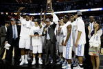 MEMPHIS, TN - MARCH 29:  Head coach Roy Williams and the North Carolina Tar Heels celebrate after defeating the Oklahoma Sooners during the NCAA Men's Basketball Tournament South Regional Final at the FedExForum on March 29, 2009 in Memphis, Tennessee. The Tar Heels defeated the Sooners 72-60 to advance to the Final Four.  (Photo by Joe Murphy/Getty Images)