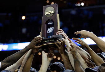 MEMPHIS, TN - MARCH 29:  The North Carolina Tar Heels hold up the South Regional trophy after defeating the Oklahoma Sooners during the NCAA Men's Basketball Tournament South Regional Final at the FedExForum on March 29, 2009 in Memphis, Tennessee. The Tar Heels defeated the Sooners 72-60 to advance to the Final Four.  (Photo by Joe Murphy/Getty Images)