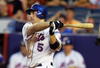 NEW YORK - AUGUST 06:  David Wright #5 of the New York Mets connects in the fifth inning against the San Diego Padres on August 6, 2008 at Shea Stadium in the Flushing neighborhood of the Queens borough of New York City.  (Photo by Jim McIsaac/Getty Images)