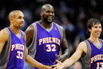 LOS ANGELES, CA - FEBRUARY 18:  Shaquille O'Neal #32 of the Phoenix Suns is congratualted by his teammate Steve Nash #13 and Grant Hill #33 during the basketball game against the Los Angeles Clippers during the second quarter at the Staples Center on February 18, 2009 in Los Angeles, California. NOTE TO USER: User expressly acknowledges and agrees that, by downloading and or using this photograph, User is consenting to the terms and conditions of the Getty Images License Agreement.  (Photo by Kevork Djansezian/Getty Images)
