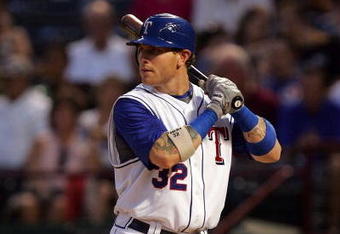 ARLINGTON, TX - AUGUST 24:  Josh Hamilton #32 of the Texas Rangers at bat against the Cleveland Indians on August 24, 2008 at Rangers Ballpark in Arlington, Texas.  (Photo by Ronald Martinez/Getty Images)
