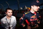 MELBOURNE, AUSTRALIA - MARCH 29:  Sebastien Bourdais of France and Scuderia Toro Rosso is seen on the grid with his manager Nicolas Todt before the Australian Formula One Grand Prix at the Albert Park Circuit on March 29, 2009 in Melbourne, Australia.  (Photo by Peter Fox/Getty Images)