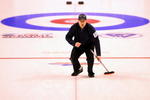 BROONFIELD, CO - FEBRUARY 28:  Skip John Shuster directs his teammates after delivering a stone against Team Tyler George during the Men's US Curling Olympic Trials Finals at the Broomfield Event Center on February 28, 2009 in Broomfield, Colorado.  (Photo by Doug Pensinger/Getty Images)
