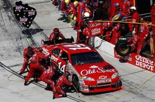MARTINSVILLE, VA - MARCH 29:  Tony Stewart driver of the #14 Old Spice/Home Depot Chevrolet makes a pit stop during the NASCAR Sprint Cup Series Goody's Fast Pain Relief 500 at the Martinsville Speedway on March 29, 2009 in Martinsville, Virginia.  (Photo by John Harrelson/Getty Images)