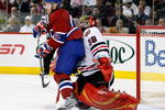 MONTREAL- MARCH 31:  Saku Koivu #11 of the Montreal Canadiens interferes with Cristobal Huet #38 of the Chicago Blackhawks during the NHL game at the Bell Centre March 31, 2009 in Montreal, Quebec, Canada.  The Canadiens defeated the Blackhawks 4-1.  (Photo by Richard Wolowicz/Getty Images)