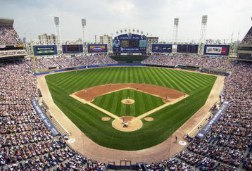 CHICAGO - JUNE 30:  A general view of Comiskey Park and the 45,351 in attendance looking out to straight away center field from above home plate as the Chicago Cubs take on the Chicago White Sox on June 30, 2002 during the inter-league game in Chicago, Illinois. Comiskey Park will host the 2003 All-Star game on July 15.  The Cubs defeated the White Sox 9-2.  (Photo by Jonathan Daniel/Getty Images)