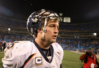 CHARLOTTE, NC - DECEMBER 14:  Jay Cutler #6 of the Denver Broncos walks off the field after the Carolina Panthers defeated them 30-10 during their game at Bank of America Stadium on December 14, 2008 in Charlotte, North Carolina  (Photo by Streeter Lecka/Getty Images)