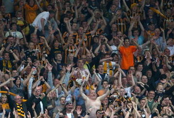 LONDON - SEPTEMBER 27: Hull City fans celebrate victory after the Barclays Premier League match between Arsenal and Hull City at the Emirates Stadium on September 27, 2008 in London, England.  (Photo by Mike Hewitt/Getty Images)
