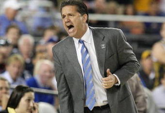 GLENDALE, AZ - MARCH 26:  Head Coach John Calipari of the Memphis Tigers adjusts his team against the Missouri Tigers in the Sweet 16 of the NCAA Division I Men's Basketball Tournament at the University of Phoenix Stadium on March 26, 2009 in Glendale, Arizona.  (Photo by Ronald Martinez/Getty Images)