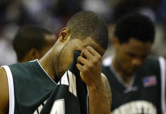 RALEIGH, NC - MARCH 20:  Peter Mulligan #44 of the Manhattan Jaspers walks off the court after a 84-80 defeat during the second round game of the NCAA Division I Men's Basketball Tournament to the Wake Forest Demon Deacons at RBC Center on March 20, 2004 in Raleigh, North Carolina.  (Photo by Ezra Shaw/Getty Images)