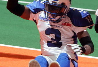 UNIONDALE, NY - FEBRUARY 6:  Will Pettis #3 of the Dallas Desperados slams the ball in frustration after failing to get out of the endzone after a New York Dragons kick off on February 6, 2005 at the Nassau Coliseum in Uniondale, New York. The Dragons defeated the Desperados 55-45.  (Photo by Jim McIsaac/Getty Images)