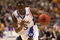 MINNEAPOLIS - MARCH 20:  Tyshawn Taylor #15 of the Kansas Jayhawks drives against the North Dakota State Bison during the first round of the NCAA Division I Men's Basketball Tournament at the Hubert H. Humphrey Metrodome on March 20, 2009 in Minneapolis, Minnesota. Kansas won 84-74. (Photo by Jonathan Daniel/Getty Images)