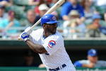 MESA, AZ - MARCH 06:  Milton Bradley #21 of the Chicago Cubs at bat during a Spring Training game against the Los Angeles Dodgers at HoHoKam Park on March 6, 2009 in Mesa, Arizona.  (Photo by Lisa Blumenfeld/Getty Images)
