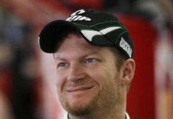 ATLANTA - MARCH 06:  Dale Earnhardt, Jr., driver of the #88 AMP Energy/National Guard Chevrolet, stands in the garage during practice for the NASCAR Sprint Cup Series Kobalt Tools 500 at the Atlanta Motor Speedway on March 6, 2009 in Hampton, Georgia.  (Photo by Geoff Burke/Getty Images for NASCAR)