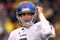 KANSAS CITY, MO - NOVEMBER 29:  Quarterback Todd Reesing #5 of the Kansas Jayhawks celebrates after  a touchdown during the first half of the game against the Missouri Tigers on November 29, 2008 at Arrowhead Stadium in Kansas City, Missouri.  (Photo by Jamie Squire/Getty Images)