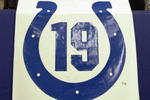 INDIANAPOLIS - SEPTEMBER 15:  Fans cheer above a banner in memory of former Baltimore Colts quarterback Johnny Unitas who passed away this past week before the Indianapolis Colts take on the Miami Dolphins on September 15, 2002 at the RCA Dome in Indianapolis, Indiana.  The Dolphins defeated the Colts 21-13.  (Photo by Jonathan Daniel/Getty Images)