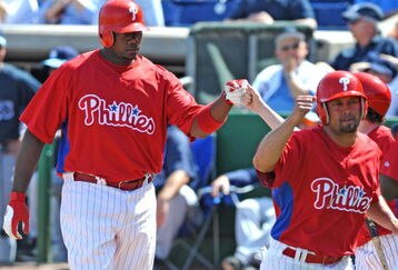 CLEARWATER, FL - FEBRUARY 28:  Infielder Ryan Howard #6 of the Philadelphia Phillies celebrates a home run against the Tampa Bay Rays February 28, 2009 at Bright House Field in Clearwater, Florida.  (Photo by Al Messerschmidt/Getty Images)