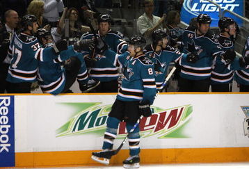 SAN JOSE, CA - MARCH 28:  Joe Pavelski #8 of the San Jose Sharks celebrates after scoring a goal against the Phoenix Coyotes during an NHL game on March 28, 2009 at HP Pavilion at San Jose in San Jose, California.  (Photo by Jed Jacobsohn/Getty Images)
