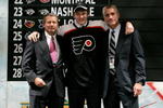 COLUMBUS, OH - JUNE 22:  Second overall pick James vanRiemsdyk of the Philadelphia Flyers poses with team General Manager Paul Holmgren,right, along with another member of team personnel onstage after being drafted in the first round of the 2007 NHL Entry Draft at Nationwide Arena on June 22, 2007 in Columbus, Ohio.  (Photo by Bruce Bennett/Getty Images)