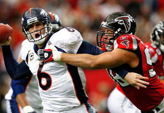 ATLANTA - NOVEMBER 16:  Jamaal Anderson #98 of the Atlanta Falcons pressures quarterback Jay Cutler #6 of the Denver Broncos during the game at the Georgia Dome on November 16, 2008 in Atlanta, Georgia.  (Photo by Kevin C. Cox/Getty Images)