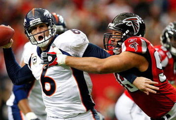 ATLANTA - NOVEMBER 16:  Jamaal Anderson #98 of the Atlanta Falcons pressures quarterback Jay Cutler #6 of the Denver Broncos during the game at the Georgia Dome on November 16, 2008 in Atlanta, Georgia.  (Photo by Kevin C. Cox/Getty Images)