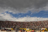 MARTINSVILLE, VA - MARCH 29: A general view of cars racing during the NASCAR Sprint Cup Series Goody's Fast Pain Relief 500 at the Martinsville Speedway on March 29, 2009 in Martinsville, Virginia.  (Photo by Rusty Jarrett/Getty Images for NASCAR)
