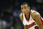 OAKLAND, CA - MARCH 30:  Monta Ellis #8 of the Golden State Warriors looks on against the Memphis Grizzlies during an NBA game on March 30, 2009 at Oracle Arena in Oakland, California. NOTE TO USER: User expressly acknowledges and agrees that, by downloading and or using this photograph, User is consenting to the terms and conditions of the Getty Images License Agreement.  (Photo by Jed Jacobsohn/Getty Images)