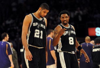 LOS ANGELES, CA - JANUARY 25:  Roger Mason #8 of the San Antonio Spurs talks to teammate Tim Duncan #21 during the game against the Los Angeles Lakers at the Staples Center on January 25, 2009 in Los Angeles, California.  The Lakers defeated the Spurs 99-85.  NOTE TO USER:  User expressly acknowledges and agrees that, by downloading and/or using this photograph, User is consenting to the terms and conditions of the Getty Images License Agreement.  (Photo by Harry How/Getty Images)