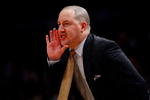 NEW YORK - MARCH 12:  Head Coach Buzz Williams of the Marquette Golden Eagles reacts on the sidelines during a game against the Villanova Wildcats during the second round of the Big East Tournament at Madison Square Garden on March 12, 2009 in New York City.  (Photo by Chris McGrath/Getty Images)