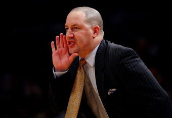 NEW YORK - MARCH 12:  Head Coach Buzz Williams of the Marquette Golden Eagles reacts on the sidelines during a game against the Villanova Wildcats during the second round of the Big East Tournament at Madison Square Garden on March 12, 2009 in New York City.  (Photo by Chris McGrath/Getty Images)