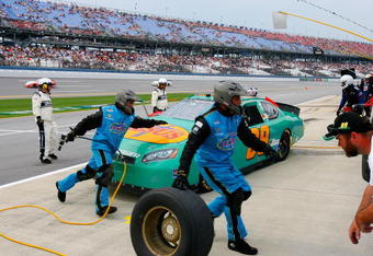 TALLADEGA, AL - APRIL 26:  Morgan Shepherd, driver of the #89 Victory In Jesus Racing Dodge, makes a pit stop during the NASCAR Nationwide Series Aaron's 312 at Talladega Superspeedway on April 26, 2008 in Talladega, Alabama.  (Photo by John Harrelson/Getty Images for NASCAR)