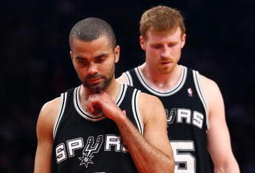 NEW YORK - FEBRUARY 17:  Tony Parker #9 and Matt Bonner #15 of the San Antonio Spurs walk up the court against the New York Knicks at Madison Square Garden February 17, 2009 in New York City. NOTE TO USER: User expressly acknowledges and agrees that, by downloading and/or using this Photograph, User is consenting to the terms and conditions of the Getty Images License Agreement.  (Photo by Chris McGrath/Getty Images)