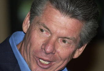 NEW YORK - MARCH 18:  World Wrestling Entertainment Chairman Vince McMahon speaks at a media conference announcing the all-star lineup of WWE WrestleMania XIX at ESPN Zone in Times Square March 18, 2003 in New York City.  (Photo by Mark Mainz/Getty Images)