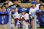 LOS ANGELES, CA - MARCH 23:  Yong-Kyu Lee #15 of Korea (C) and teammates look on from the dugout in the tenth inning of the finals of the 2009 World Baseball Classic against Japan on March 23, 2009 at Dodger Stadium in Los Angeles, California. Japan won 5-3 in 10 innings.  (Photo by Kevork Djansezian/Getty Images)