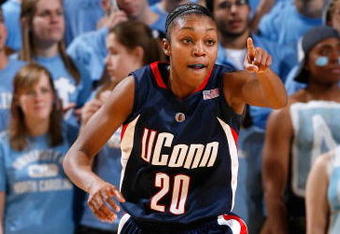 CHAPEL HILL, NC - JANUARY 19:  Renee Montgomery #20 of the Connecticut Huskies reacts after a basket against the North Carolina Tar Heels during the game on January 19, 2009 at the Dean E. Smith Center in Chapel Hill, North Carolina.  (Photo by Kevin C. Cox/Getty Images)