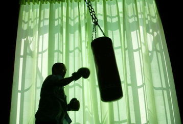 HAIKOU, CHINA - JUNE 14:  (CHINA OUT; PHOTOCOME OUT)  An inmate hits a punching bag in a catharsis room at Haikou Prison June 14, 2005 in Haikou, Hainan Province, China. A mental health consulting center was opened June 14 at the prison to provide psychological care for inmates. According to state media, China has carried out prison reform in big cities like Shanghai, Chongqing and Wuhan, with measures to better protect the rights and interests of prison inmates. Educational programs, vocational training, psychotherapy and community correctional methods have been adopted in these prisons.  (Photo by China Photos/Getty Images)