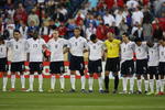 NASHVILLE - APRIL 01: Memebers of the U.S. National Team (L-R) Frankie Hejduk #2, Clint Dempsey #8, Jozy Altidore #17, Michael Bradley #12, Oguchi Onyewu #5, Brian Ching #11, Tim Howard #1, Carlos Bocanegra #3, Pablo Mastroeni #4, DaMarcus Beasley #7 and Landon Donovan #10 participate in a moment of silence for victims of a soccer tragedy on the Ivory Coast last weekend before a FIFA 2010 World Cup Qualifying match against Trinidad and Tobago on April 1, 2009 at LP Field in Nashville, Tennessee. The U.S. defeated Trinidad and Tobago 3-0. (Photo by Jonathan Daniel/Getty Images)