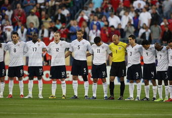NASHVILLE - APRIL 01: Memebers of the U.S. National Team (L-R) Frankie Hejduk #2, Clint Dempsey #8, Jozy Altidore #17, Michael Bradley #12, Oguchi Onyewu #5, Brian Ching #11, Tim Howard #1, Carlos Bocanegra #3, Pablo Mastroeni #4, DaMarcus Beasley #7 and Landon Donovan #10 participate in a moment of silence for victims of a soccer tragedy on the Ivory Coast last weekend before a FIFA 2010 World Cup Qualifying match against Trinidad and Tobago on April 1, 2009 at LP Field in Nashville, Tennessee. The U.S. defeated Trinidad and Tobago 3-0. (Photo by Jonathan Daniel/Getty Images)