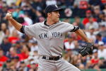BOSTON - SEPTEMBER 28: Mike Mussina #35 of the New York Yankees throws against the Boston Red Sox at Fenway Park September 28, 2008 in Boston, Massachusetts. (Photo by Jim Rogash/Getty Images)