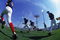 25 Jun 2001:  A general view of the first pre-game stretching warmup for the Brooklyn Cyclones at their new park adjacent to Coney Island before their first Minor League Class A Baseball game against the Mahoning Valley Scrappers at the Keyspan Park in Brooklyn, New York.  The Cyclones defeated the Scrappers 3-2.Mandatory Credit: Al Bello  /Allsport