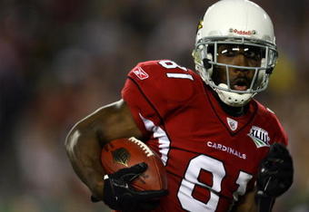 TAMPA, FL - FEBRUARY 01:  Wide receiver Anquan Boldin #81 of the Arizona Cardinals runs for yards after the catch on a 45-yard reception in the second quarter against the Pittsburgh Steelers during Super Bowl XLIII on February 1, 2009 at Raymond James Stadium in Tampa, Florida.  (Photo by Jamie Squire/Getty Images)