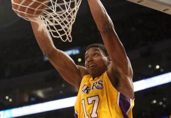 LOS ANGELES - JANUARY 27: Andrew Bynum #17 of the Los Angeles Lakers dunks against the Charlotte Bobcats on January 27, 2009 at Staples Center in Los Angeles, California.   NOTE TO USER: User expressly acknowledges and agrees that, by downloading and/or using this Photograph, user is consenting to the terms and conditions of the Getty Images License Agreement. (Photo by Stephen Dunn/Getty Images)