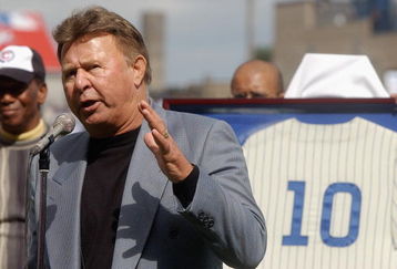 CHICAGO - SEPTEMBER 28:  Former Chicago Cub third baseman Ron Santo speaks to the fans during a retirement ceremony for Santo's uniform number 10 before a game against the Pittsburgh Pirates on September 28, 2003 at Wrigley Field in Chicago, Illinois.  The Pirates defeated the Cubs 3-2.  (Photo by Jonathan Daniel/Getty Images)