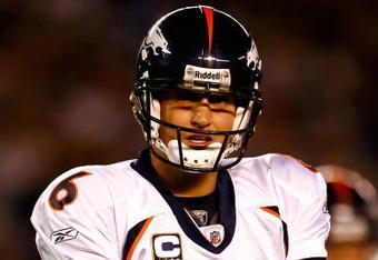 SAN DIEGO - DECEMBER 28:  Quarterback Jay Cutler #6 of the Denver Broncos grabs his right arm after throwing a pass against the San Diego Chargers during the NFL game at Qualcomm Stadium on December 28, 2008 in San Diego, California.  (Photo by Jeff Gross/Getty Images)